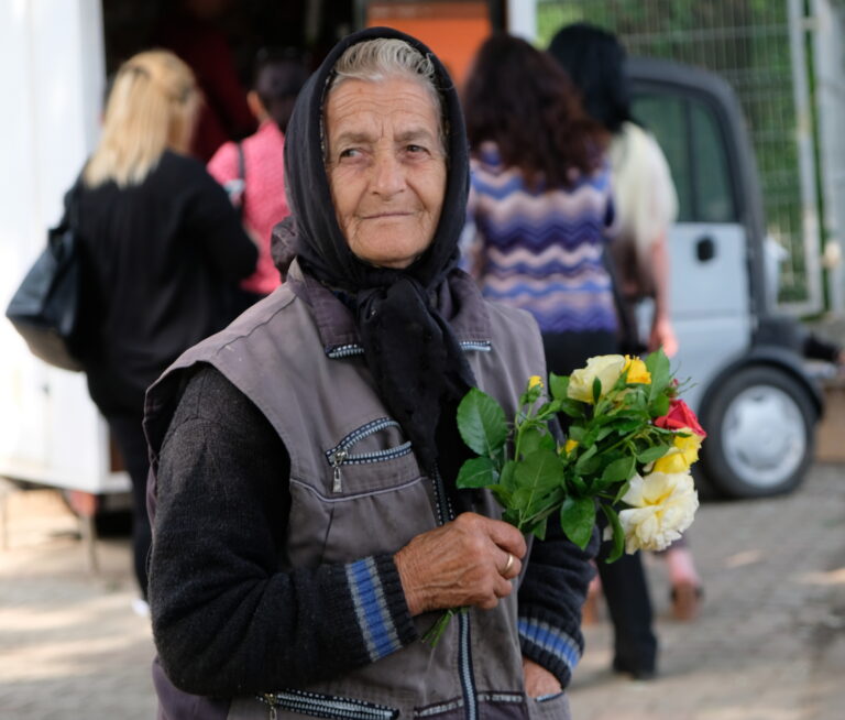 Romania Pipera flowerselling lady at the exit of underground